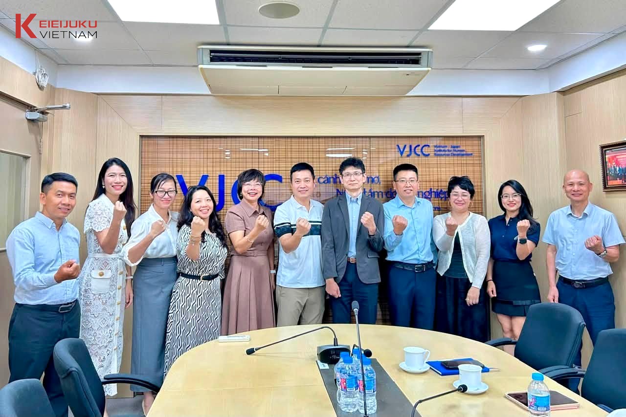 Members pose for a commemorative photo in a VJCC meeting room. Photo: KEI